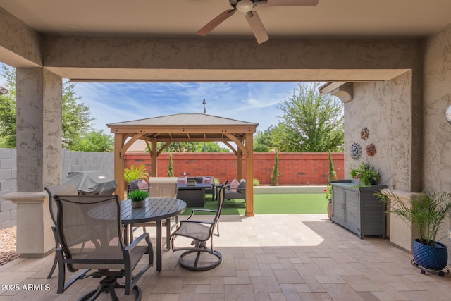 2605 S Quaintance St, Gilbert, AZ 85295 - fenced backyard with a gazebo, ceiling fan, grilling area, a patio area, and outdoor dining space