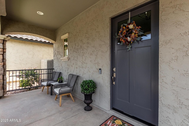 2605 S Quaintance St, Gilbert, AZ 85295 - entrance to property featuring stucco siding and a balcony