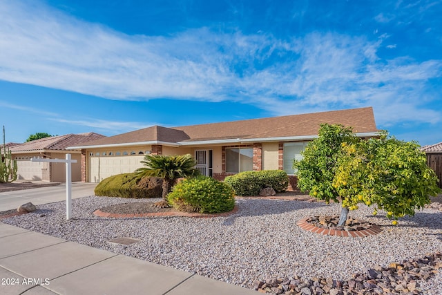 ranch-style home with a garage