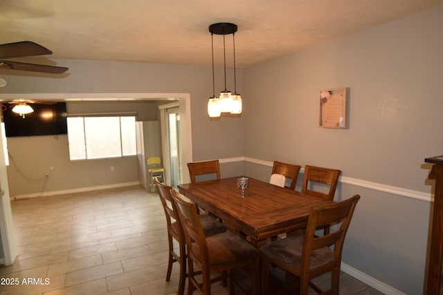 dining space with ceiling fan