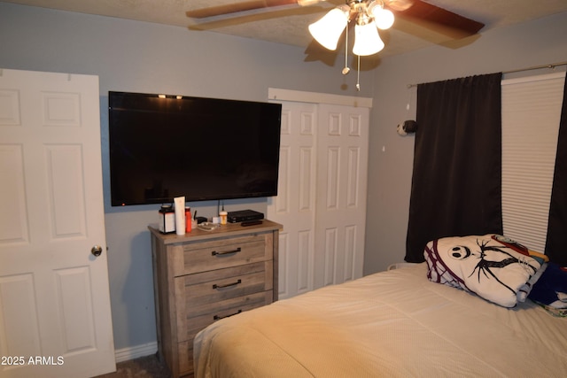 bedroom featuring a closet and ceiling fan