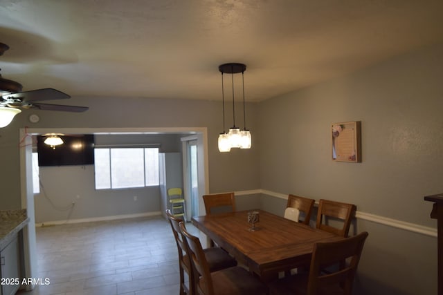 dining area featuring ceiling fan