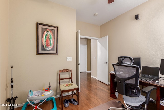 home office featuring hardwood / wood-style floors