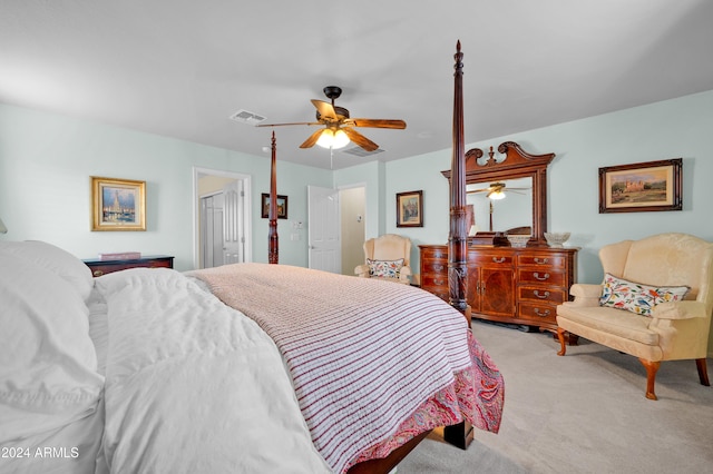 bedroom featuring light carpet and ceiling fan