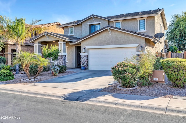 view of front of property with a garage