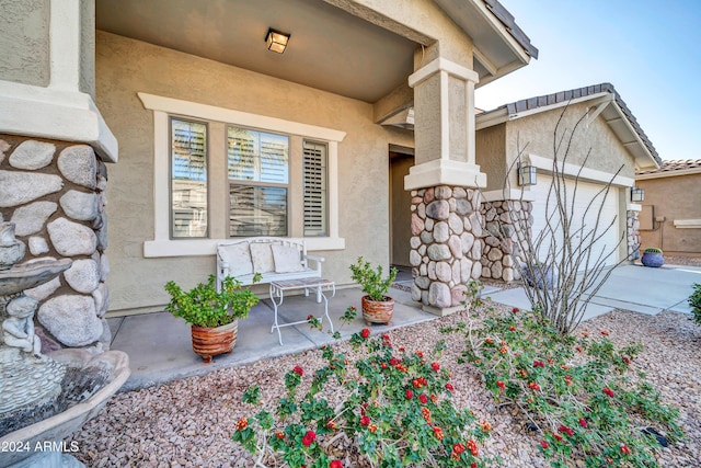 doorway to property featuring a garage