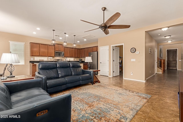 291 E Canyon Rock Rd, San Tan Valley, AZ 85143 - living room featuring a ceiling fan, light tile patterned flooring, baseboards, visible vents, and recessed lighting