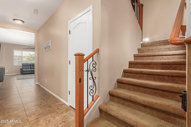 291 E Canyon Rock Rd, San Tan Valley, AZ 85143 - staircase featuring baseboards, tile patterned flooring, and ceiling fan