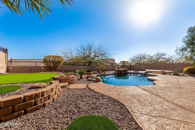 view of swimming pool featuring a fenced in pool, a fenced backyard, and a patio area