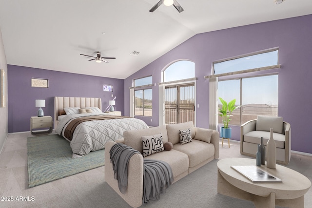 bedroom featuring lofted ceiling, carpet flooring, visible vents, and ceiling fan