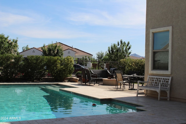 view of pool with a patio area