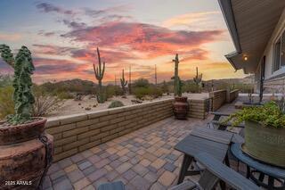 view of patio terrace at dusk