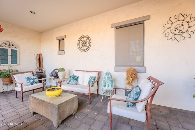 view of patio with an outdoor living space