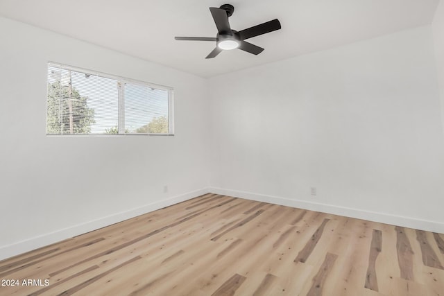 unfurnished room featuring light hardwood / wood-style floors and ceiling fan