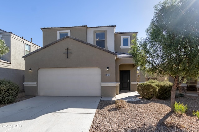 view of front of house with a garage