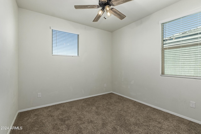 carpeted empty room with ceiling fan