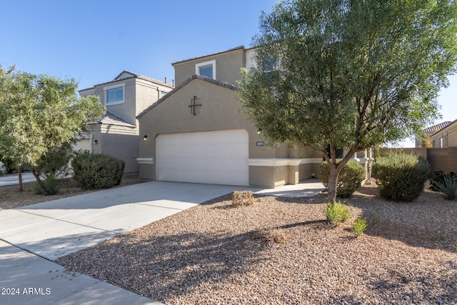 view of front of property with a garage