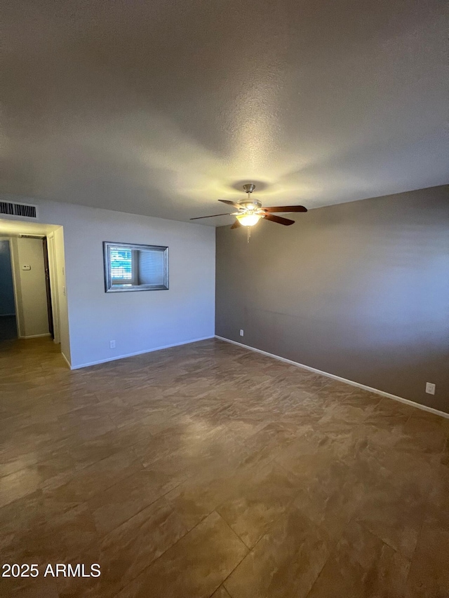 440 S Parkcrest Unit 22, Mesa, AZ 85206 - spare room featuring ceiling fan and baseboards