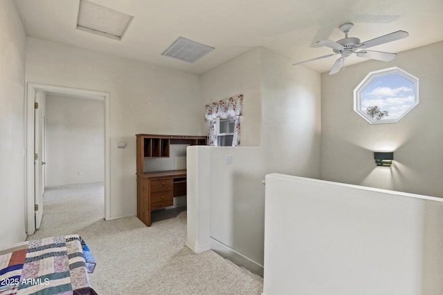 bedroom with light colored carpet and ceiling fan