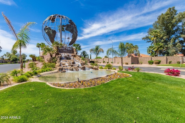 view of community with a yard