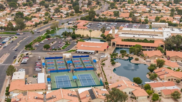 birds eye view of property with a residential view