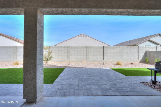 view of patio featuring a fenced backyard