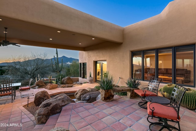 view of patio / terrace featuring a mountain view