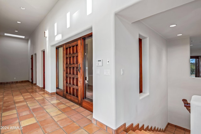 foyer with light tile flooring