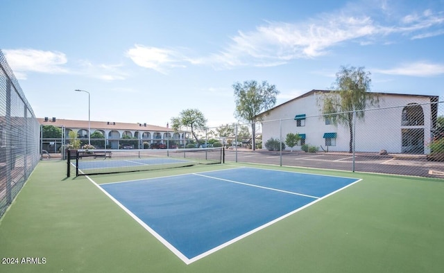 view of tennis court with basketball court