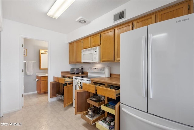 kitchen with white appliances