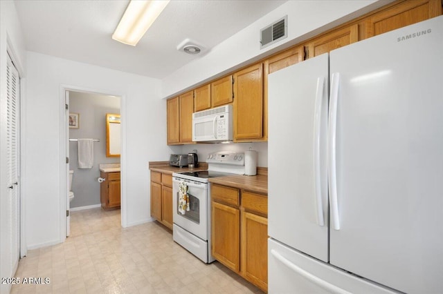 kitchen with white appliances