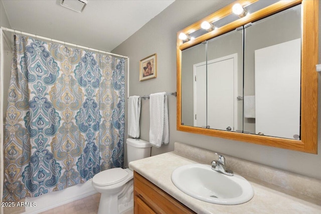 full bathroom featuring shower / tub combo, vanity, and toilet