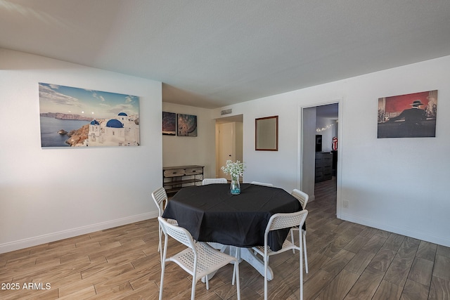310 E Fremont Dr, Tempe, AZ 85282 - dining room with wood finished floors and baseboards