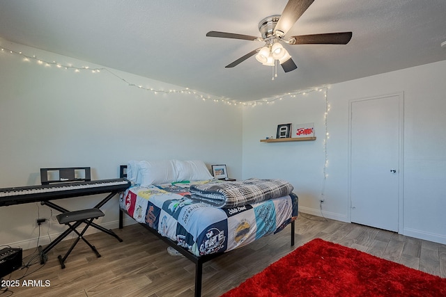 310 E Fremont Dr, Tempe, AZ 85282 - bedroom featuring wood finished floors, a ceiling fan, and baseboards