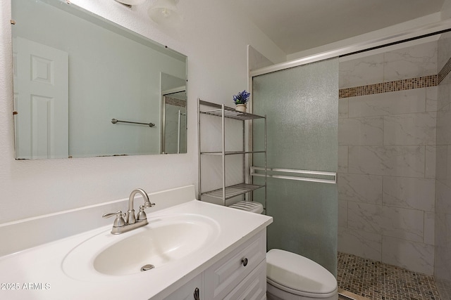 310 E Fremont Dr, Tempe, AZ 85282 - bathroom featuring toilet, a stall shower, and vanity