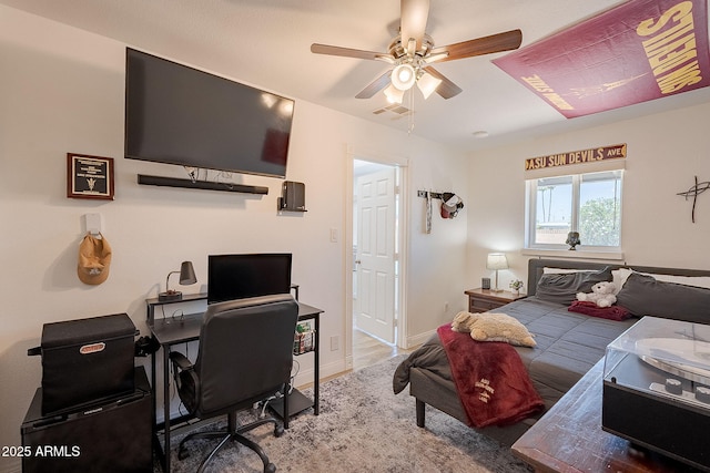 310 E Fremont Dr, Tempe, AZ 85282 - bedroom with an office area, a ceiling fan, and baseboards