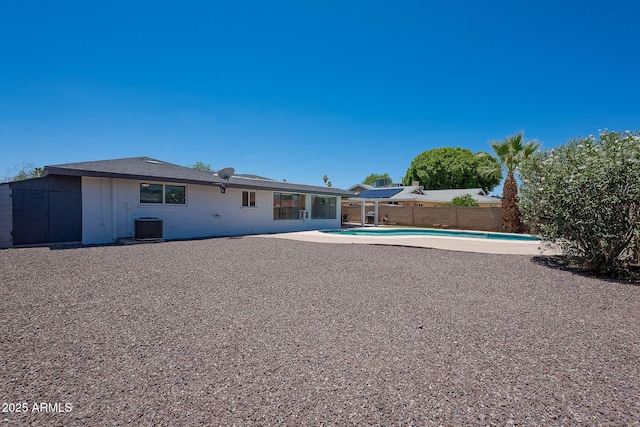 310 E Fremont Dr, Tempe, AZ 85282 - back of property with a fenced backyard, central AC unit, and a patio