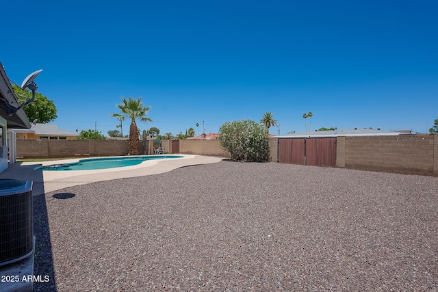 310 E Fremont Dr, Tempe, AZ 85282 - view of pool with central AC unit, a fenced backyard, and a patio