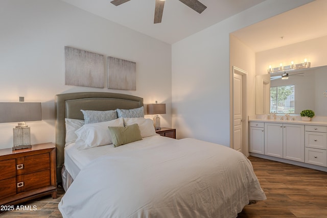 bedroom with a sink, dark wood finished floors, connected bathroom, and ceiling fan