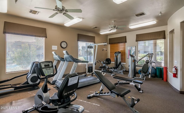 exercise room featuring ceiling fan