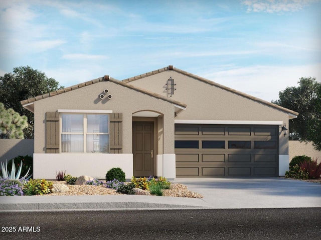 view of front of house with a garage, driveway, and stucco siding