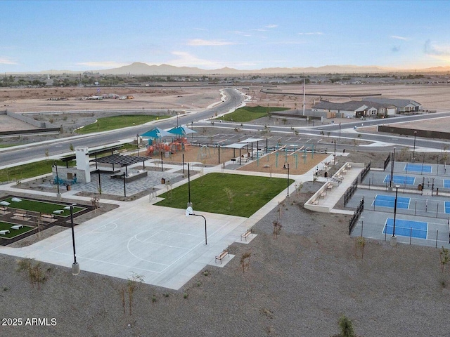 birds eye view of property featuring a mountain view