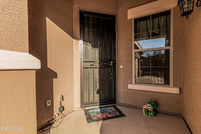 16077 W Anasazi St, Goodyear, AZ 85338 - property entrance featuring stucco siding
