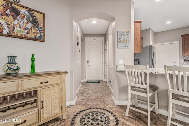 16077 W Anasazi St, Goodyear, AZ 85338 - entryway with arched walkways and recessed lighting