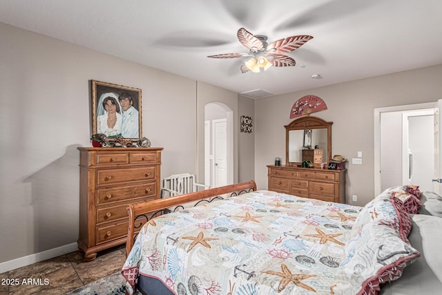 16077 W Anasazi St, Goodyear, AZ 85338 - bedroom featuring arched walkways and ceiling fan