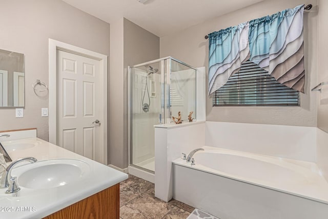 16077 W Anasazi St, Goodyear, AZ 85338 - bathroom featuring a stall shower, a garden tub, and double vanity