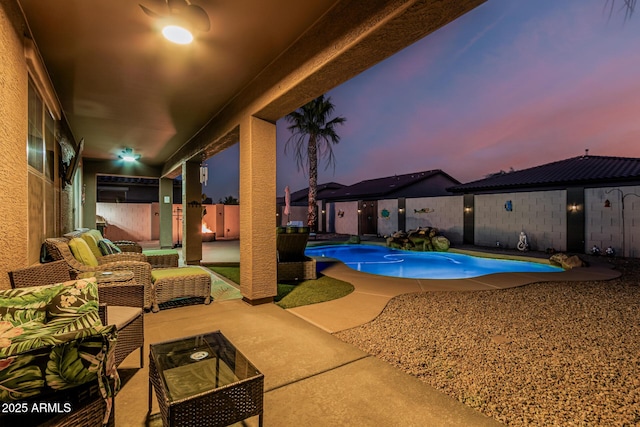 16077 W Anasazi St, Goodyear, AZ 85338 - view of swimming pool featuring a fenced backyard and a patio area