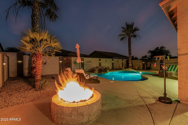 16077 W Anasazi St, Goodyear, AZ 85338 - view of pool with a patio area, an outdoor fire pit, and a fenced backyard