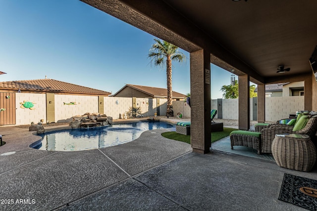 16077 W Anasazi St, Goodyear, AZ 85338 - view of swimming pool with a fenced backyard and a patio area