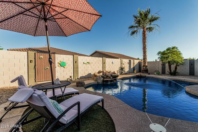16077 W Anasazi St, Goodyear, AZ 85338 - view of swimming pool with a fenced backyard